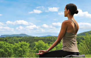 a woman doing yoga- and mindfulness-based education at Kripalu Center for Yoga & Health Stockbridge, MA