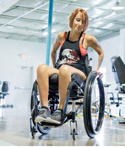woman training on a wheelchair at Orthwein Center