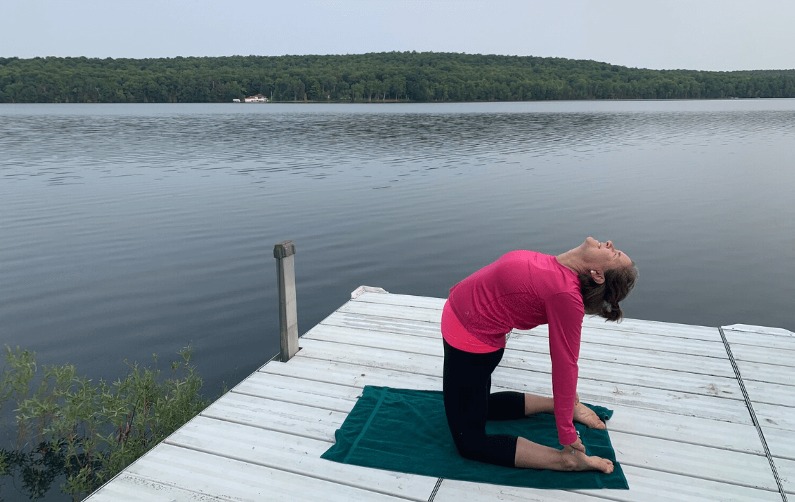 a woman practicing three-way yoga